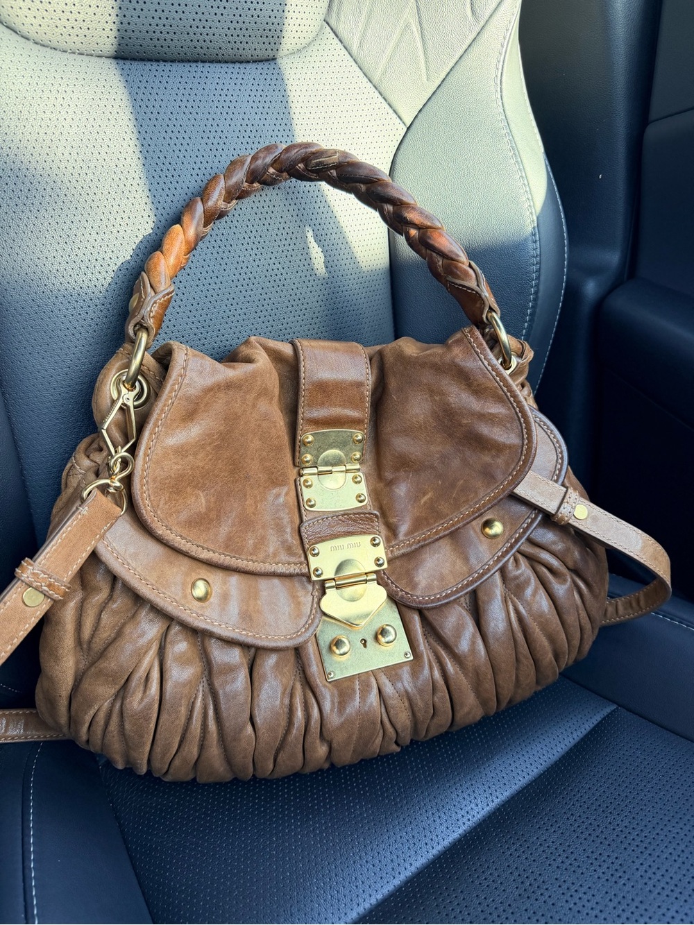 MIU MIU
Noce Matelasse Leather Coffer Hobo Bag